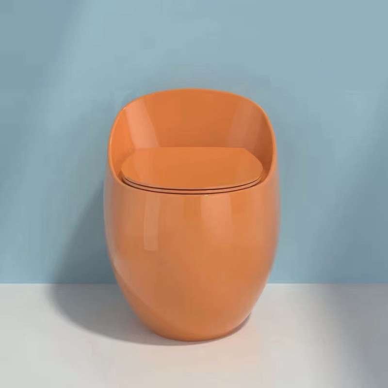 Toilette orange tendance, sans bride, monobloc design, chasse éco 3.6L