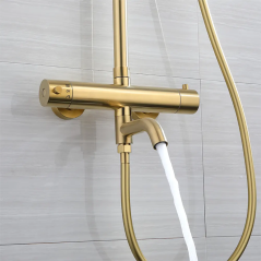 "Colonne Bain-Douche Ibar : Élégance Dorée et Confort Thermostatique Unique"