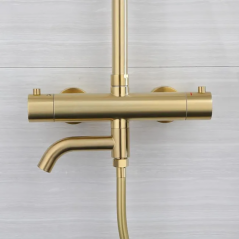 "Colonne Bain-Douche Ibar : Élégance Dorée et Confort Thermostatique Unique"