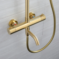 "Colonne Bain-Douche Ibar : Élégance Dorée et Confort Thermostatique Unique"